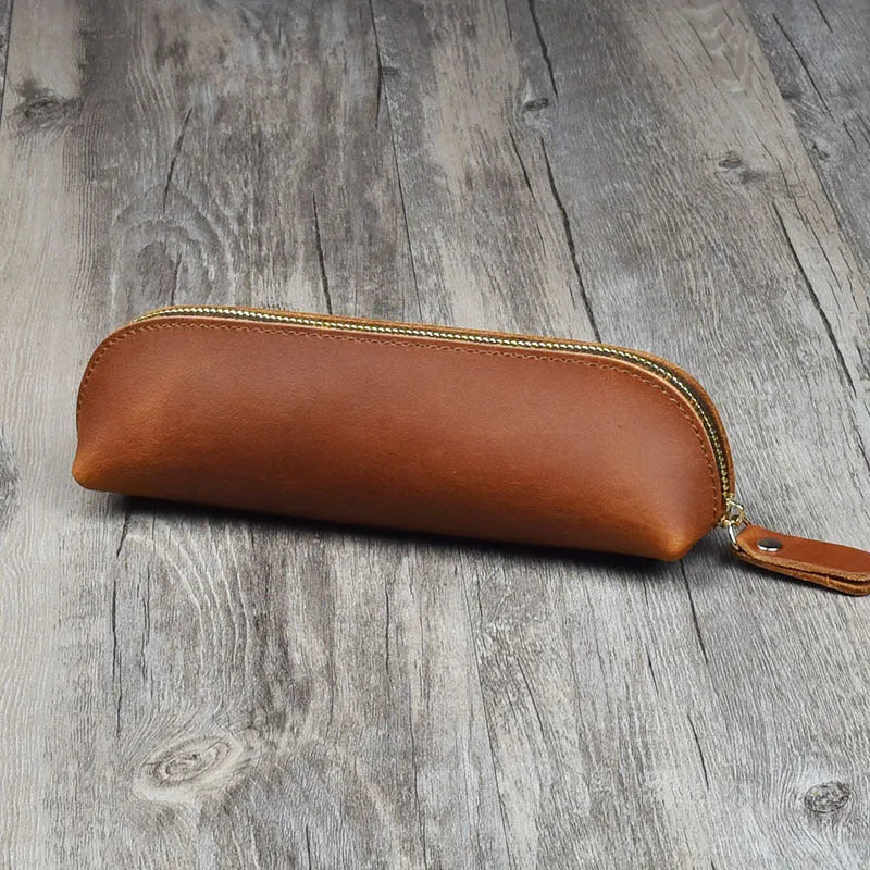 Square leather pencil case in genuine cowhide measuring 18cm with zipper closure