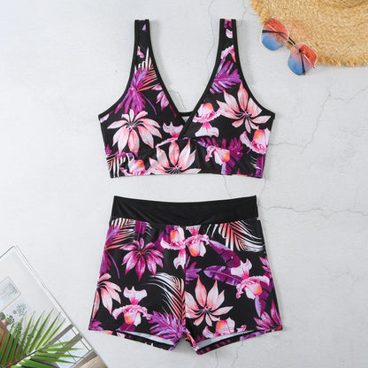 Women's two-piece swimsuit set showing sleeveless bikini top and printed boxer-style briefs in a multi-colour pattern.