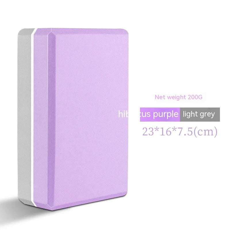 High-density EVA foam yoga block in violet colour, shown next to a pink block with a cartoon bunny print.