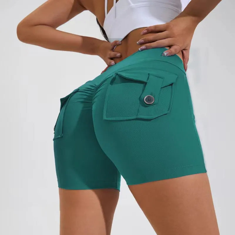 Women's high-waist quick-dry fitness shorts with side pockets in avocado green colour