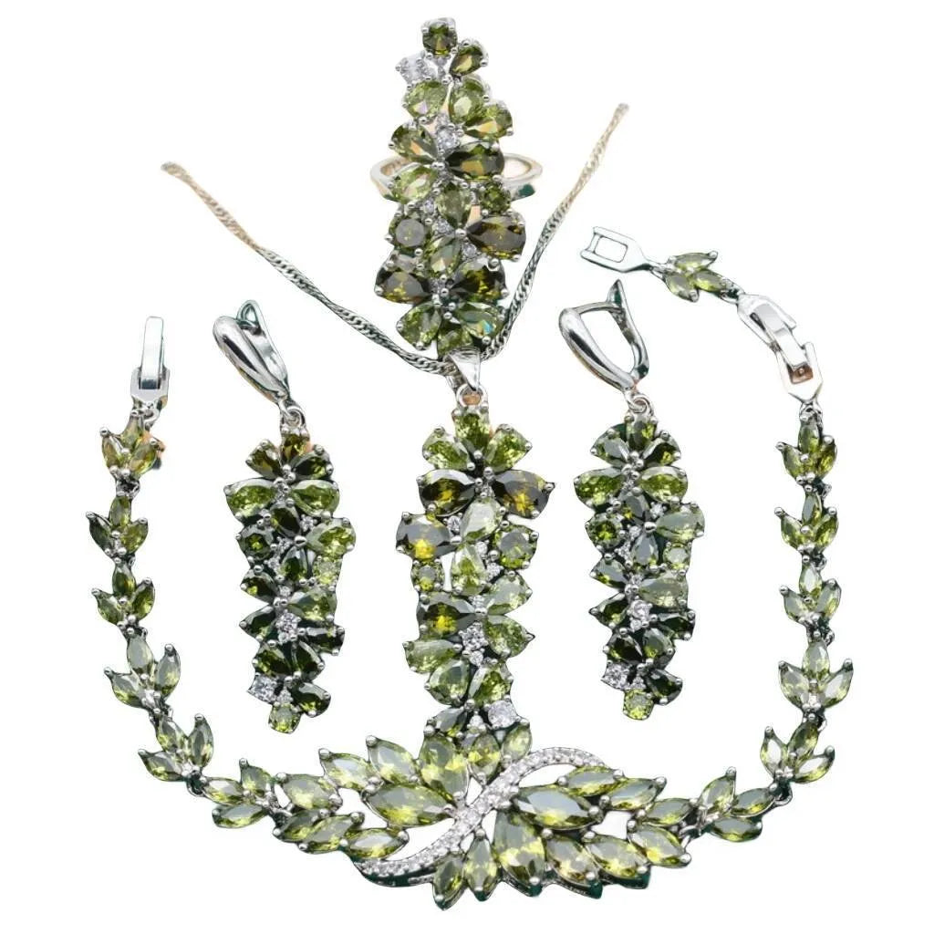 Vintage jewellery set with floral patterns showing necklace, bracelet, earrings and ring in olive green colour