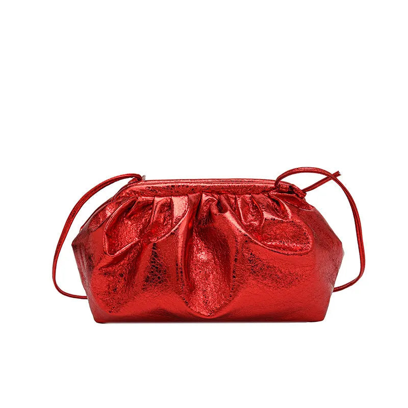 Simple Hair Clip crossbody bag in rose red showing shell shape, front zipper, and adjustable shoulder strap.