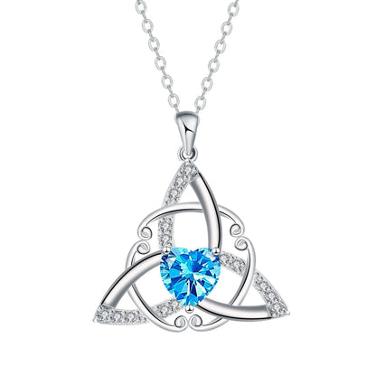 Close-up of a geometric Celtic knot pendant necklace for women in an electroplated blue finish on a copper base.