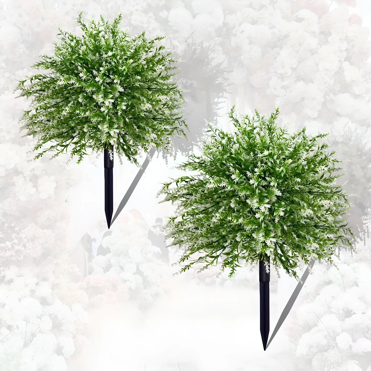 White artificial lavender plant with green leaves, a plastic floor decoration for home or events.