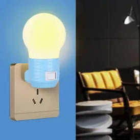Plug-in bedside baby night light in white, blue, or pink shell with round shape.