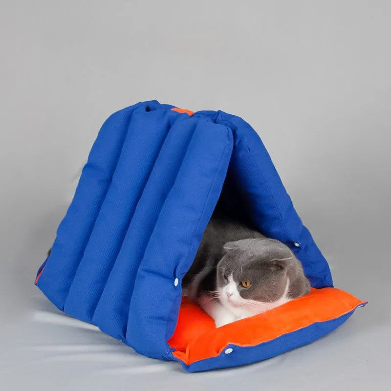 Blue triangular cat bed with drilled connectors and removable cotton cover