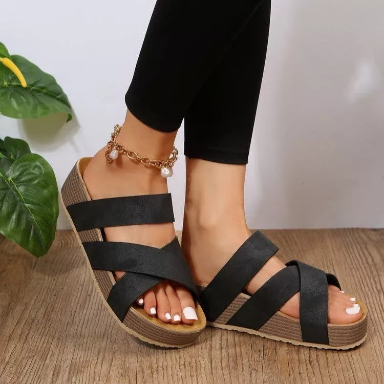 Women's woven cross-strap slippers in various colours, perfect for summer beach outings