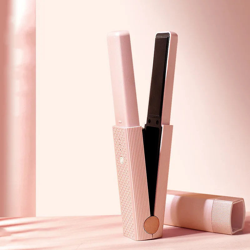 Pink and green portable USB hair straightener and curling iron 3-in-1 tool with compact design.