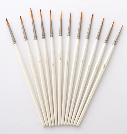 Set of 12 pearl white nylon wool hook line art brushes in a solid wood pen holder.
