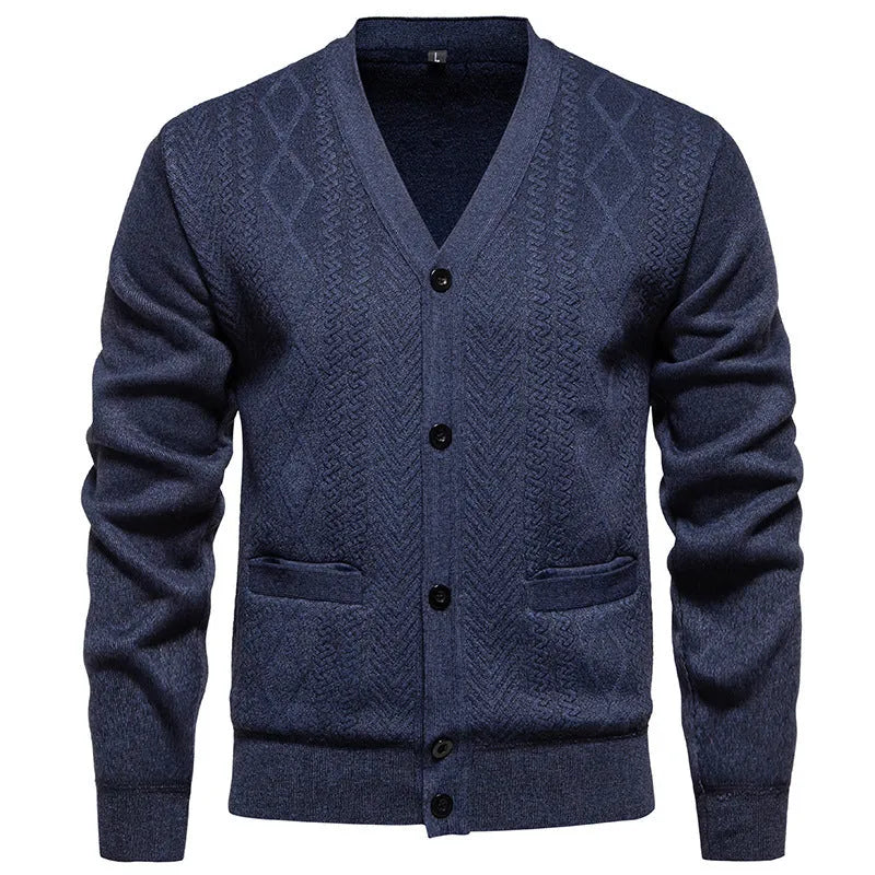 Man wearing a brown striped wool-lined cardigan sweater, showing the open front and long sleeves.