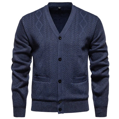 Man wearing a brown striped wool-lined cardigan sweater, showing the open front and long sleeves.