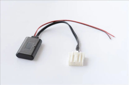 Black JieRui-BT 5908 Bluetooth audio cable for Mazda car models from 2006 onwards.