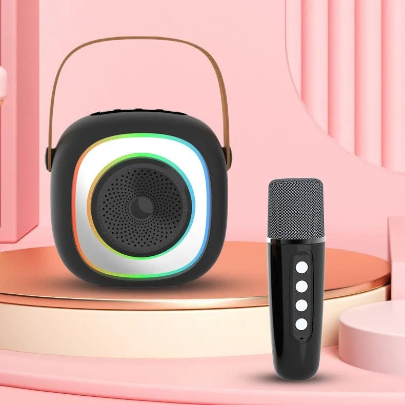 Wireless karaoke microphone with LED lighting in black, white, or pink colour options