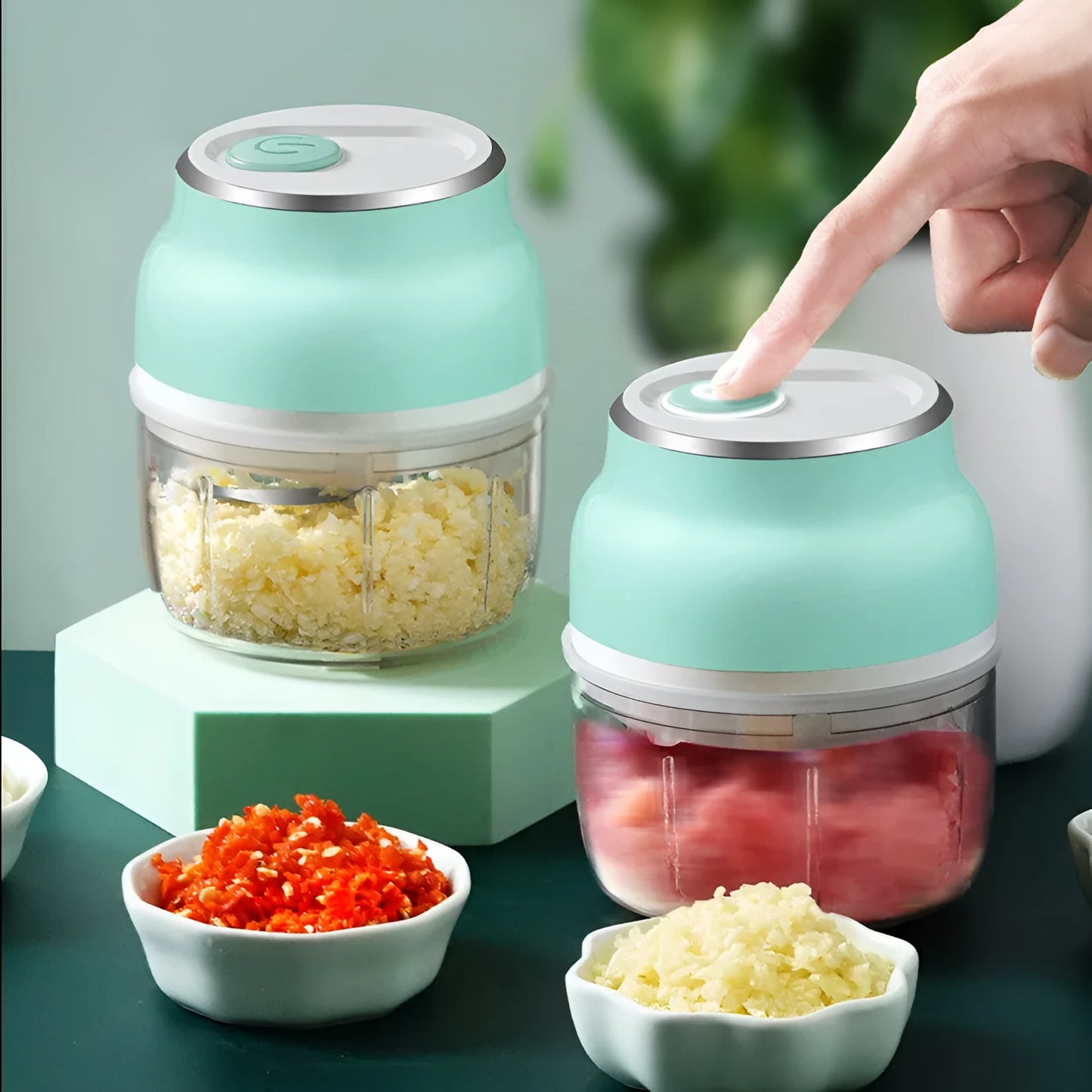 Green portable electric garlic chopper with transparent cup and USB charging cable