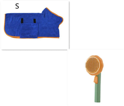Hand-held pumpkin-coloured pet brush with stainless steel needles for grooming cats and dogs