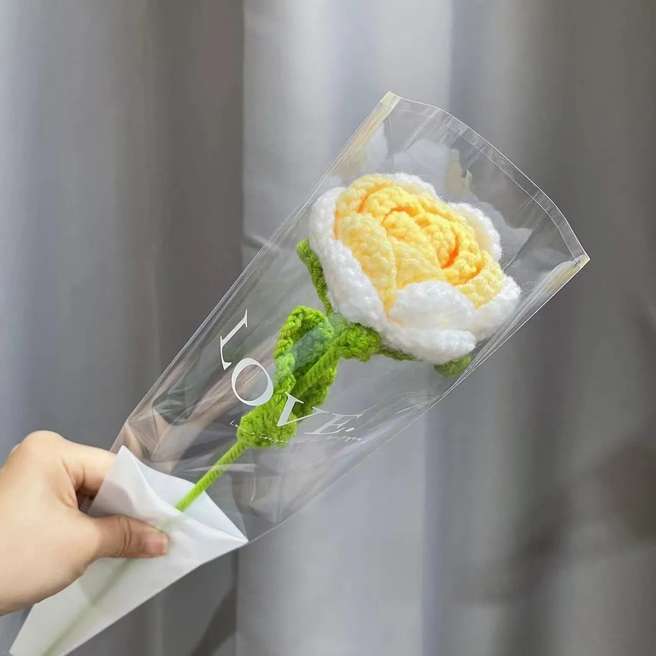 Wool-woven artificial silk rose bouquet in gradient blue colour with textured floral arrangement