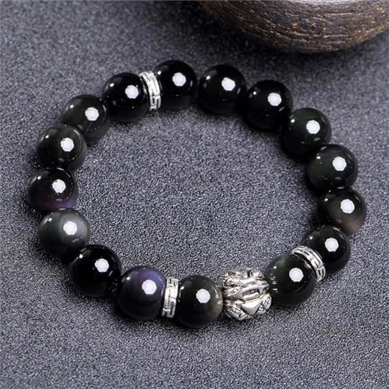 Silver 999 obsidian stone bracelet for men and women in 10mm and 12mm sizes.