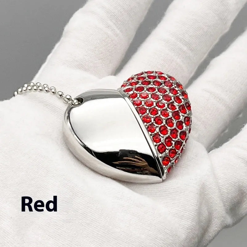 Blue heart-shaped USB flash drive with a brick-inlaid pattern on its metal surface.
