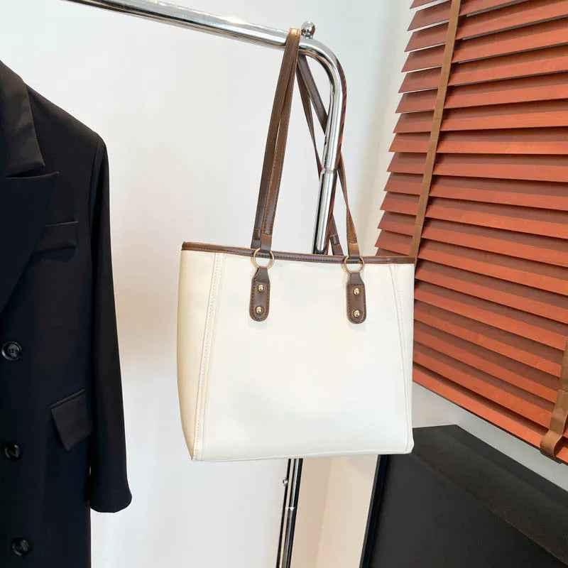 Korean style black PU leather shoulder underarm bag with a horizontal square shape and sandwich pocket.