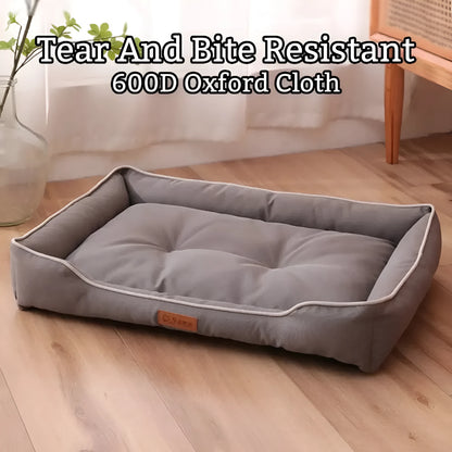 Waterproof dog sofa bed in grey Oxford cloth showing raised sides and rectangular shape