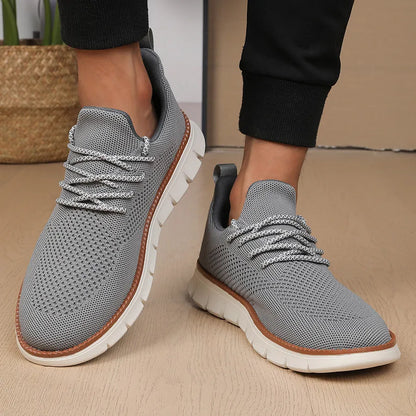 Men's grey and black low-heel casual sneaker with mesh fabric upper and round toe