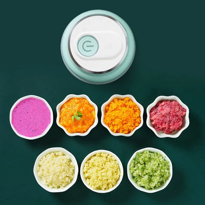 Green portable electric garlic chopper with transparent cup and USB charging cable