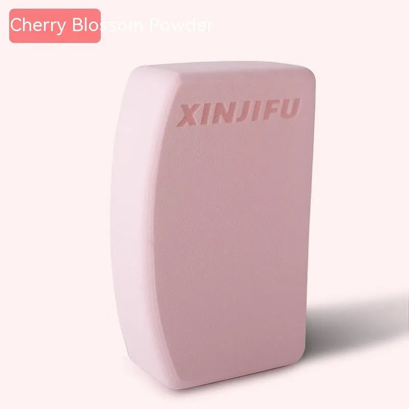 High-density EVA foam yoga block in violet colour, shown next to a pink block with a cartoon bunny print.
