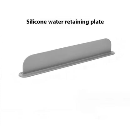 Grey-blue silicone kitchen sink water blocking plate measuring 52mm by 85mm