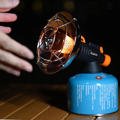 Black and orange portable heating stove with automatic ignition for camping, weighing 215g.