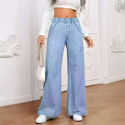 Wide-leg plus size denim trousers in light blue washed colour with straight cut and mid-waist design
