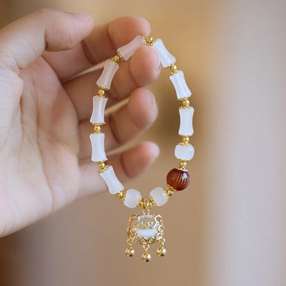 Women's Chinese-style glass bracelet with safety lock charm in choice of three colour options