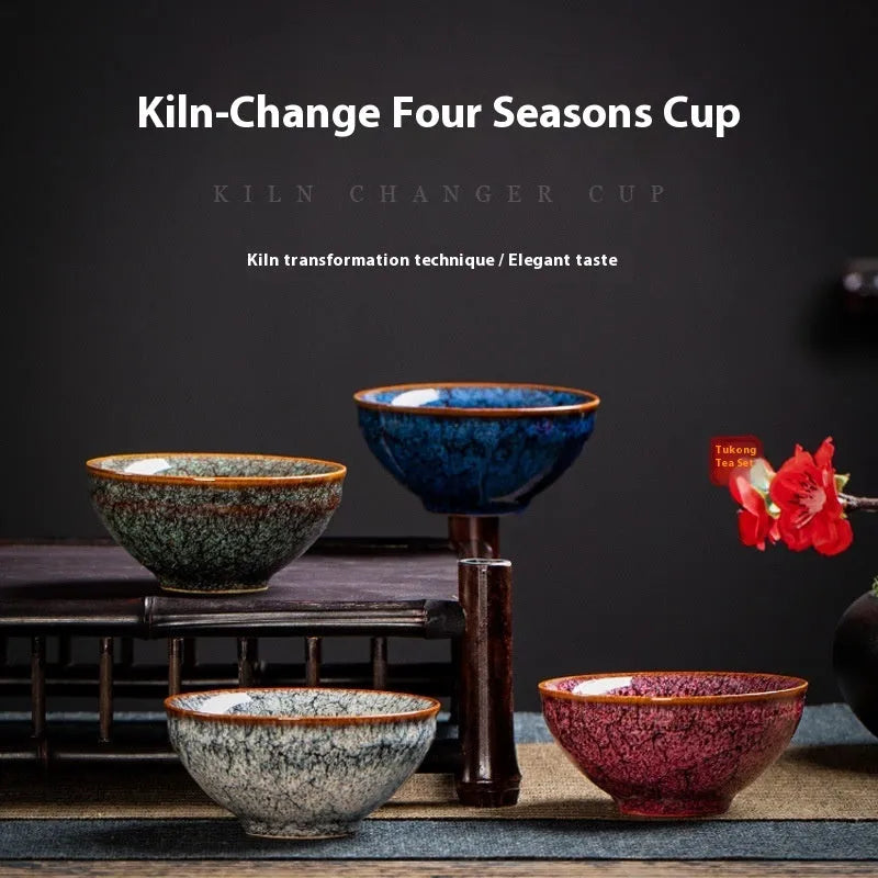 Set of four new Chinese style ceramic Kung Fu tea cups in a light-coloured gift box.