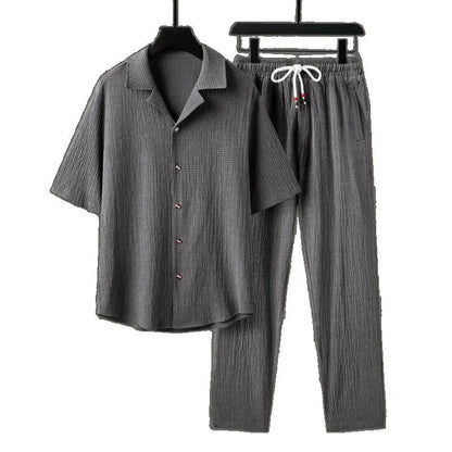 Men's Chinese style casual two-piece sportswear set with short sleeve top and trousers
