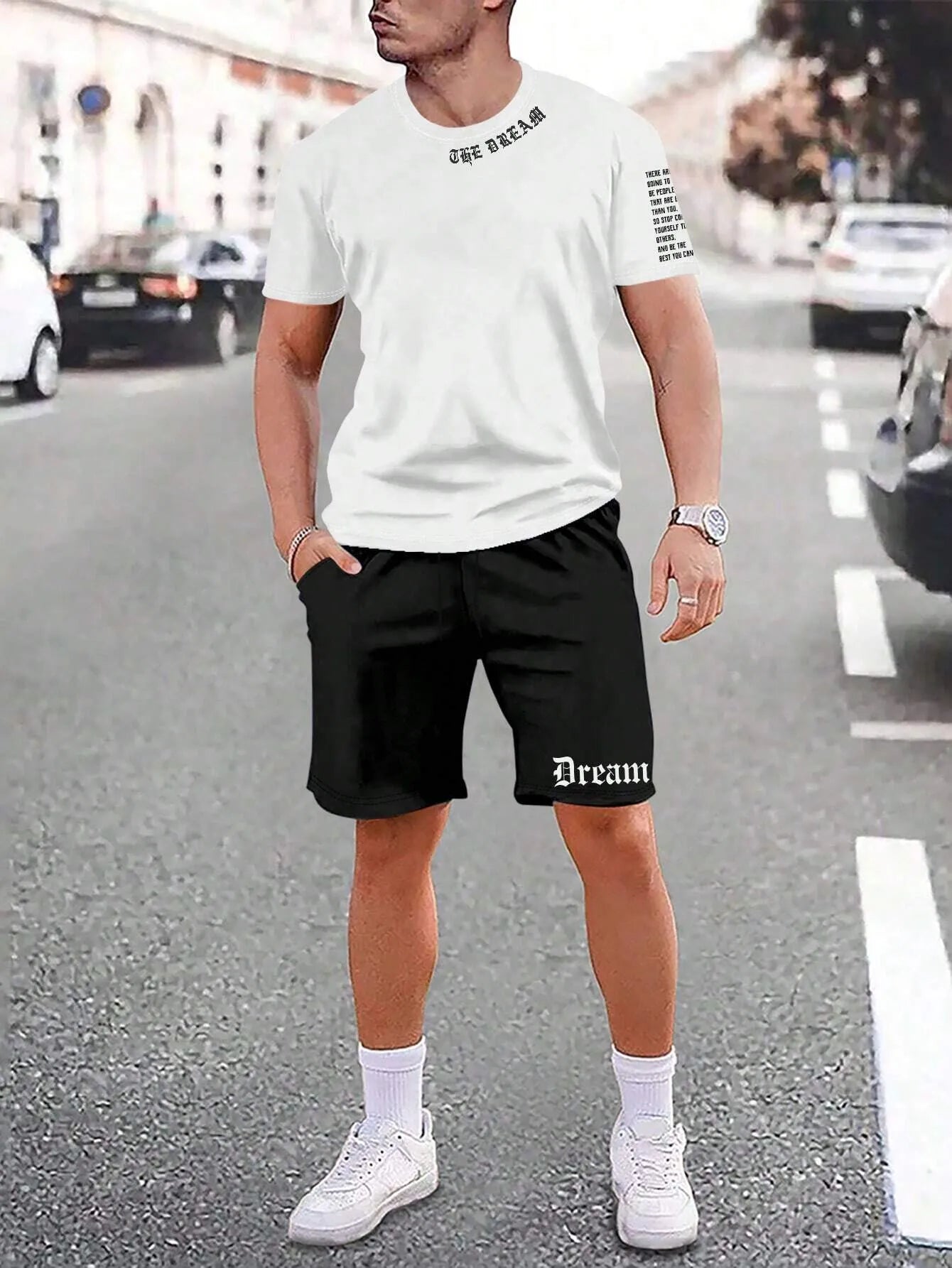 Man wearing a printed short-sleeve sports top and matching shorts in a quick-dry polyester blend.