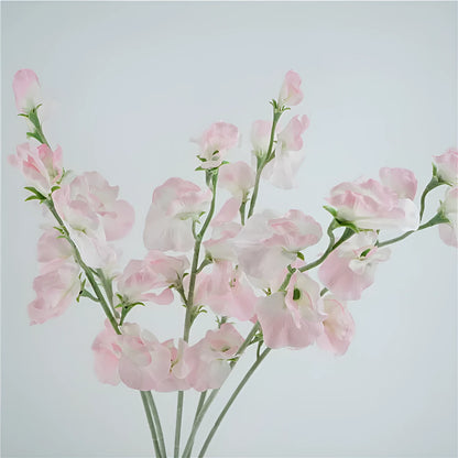 Artificial silk pea flower single stem in pink, purple, red, or white colours measuring 40cm height