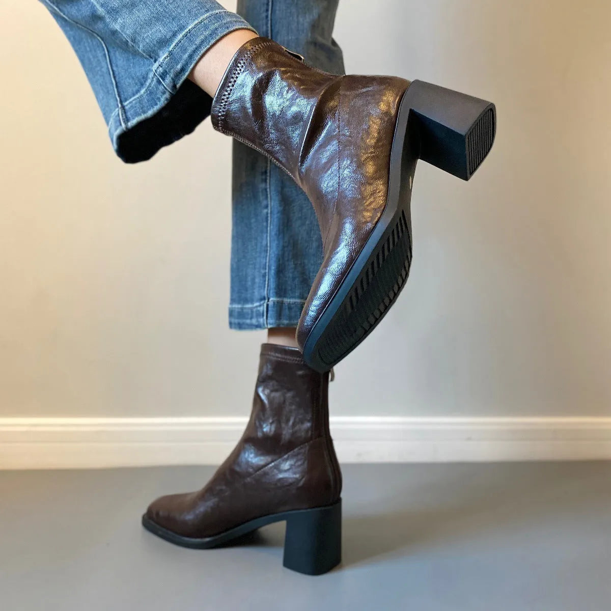 Women's retro ankle boots with chunky mid heel, square toe, back zipper, black microfibre upper, rubber sole.
