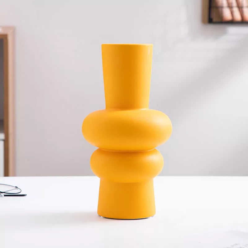 Nordic minimalist ceramic vase with glazed finish in blue, yellow, and orange options
