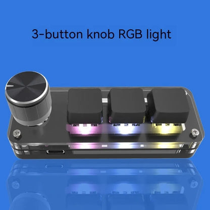 Black and white programmable mini keyboard with RGB backlight and copy/paste keys showing compact 15cm size