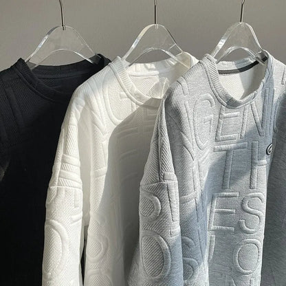 Grey men's short sleeve T-shirt with a raised retro letter design on the front.