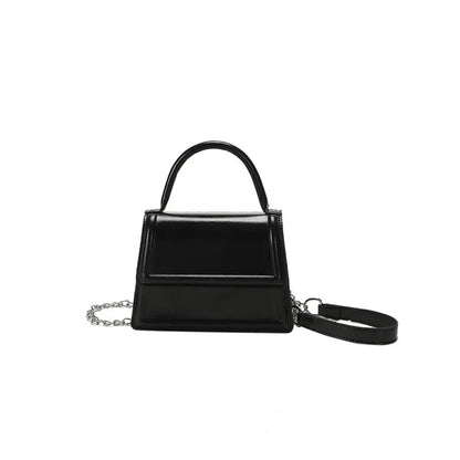 Retro horizontal square PU crossbody bag in multiple colours with sewn detail.