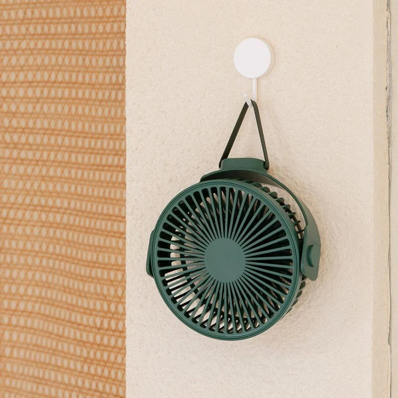 Portable USB desk fan with 360-degree rotation, multiple wind speeds, and long-lasting battery life