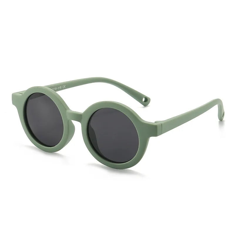 Children's round-frame polarised sunglasses with soft TPEE frame for ages 0-3, shown in assorted colours.