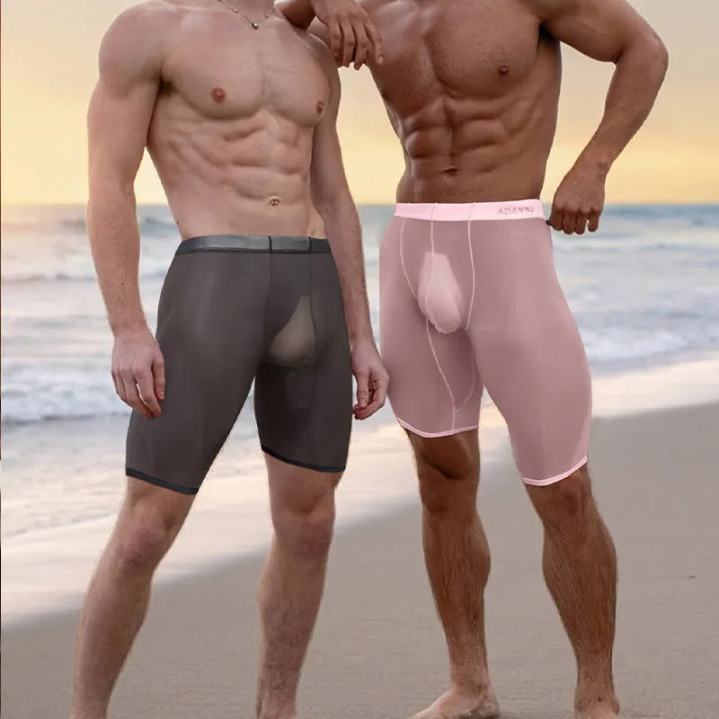 Men's black seamless nylon mesh lounge shorts on a hanger, showing hip-lift design and knitted texture.