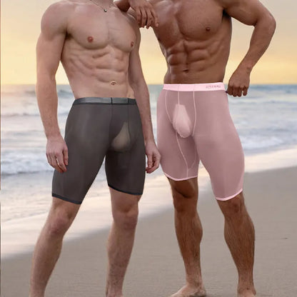 Men's black seamless nylon mesh lounge shorts on a hanger, showing hip-lift design and knitted texture.