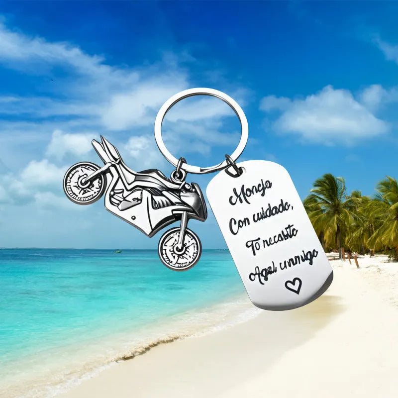 Stainless steel motorcycle-themed keychain with modern design and protective flannel bag