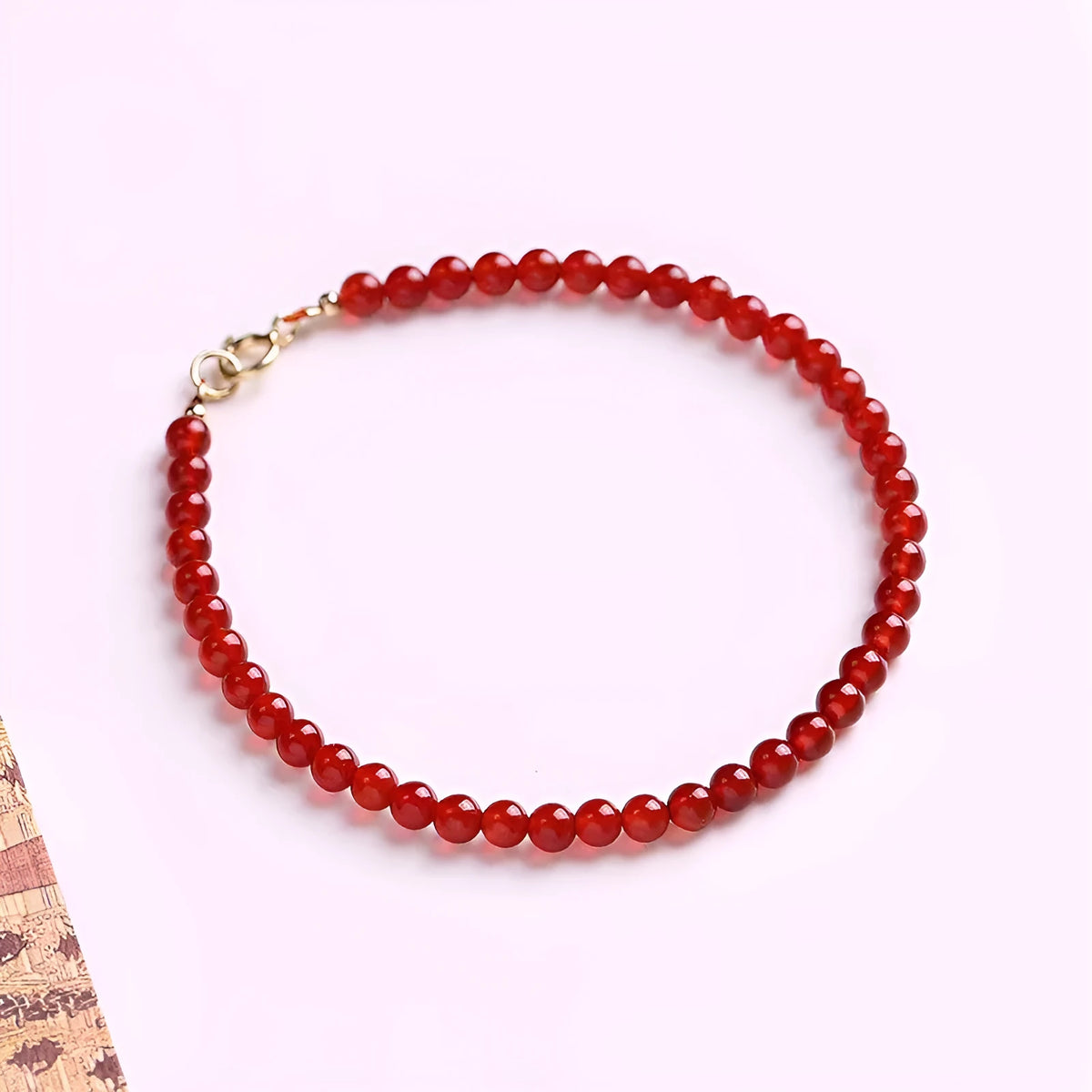 Ultra-thin red agate women's bracelet in classic style on wrist