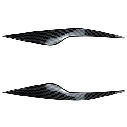 Ford Focus headlight eyebrow stickers in ABS plastic with carbon fibre pattern or piano black finish
