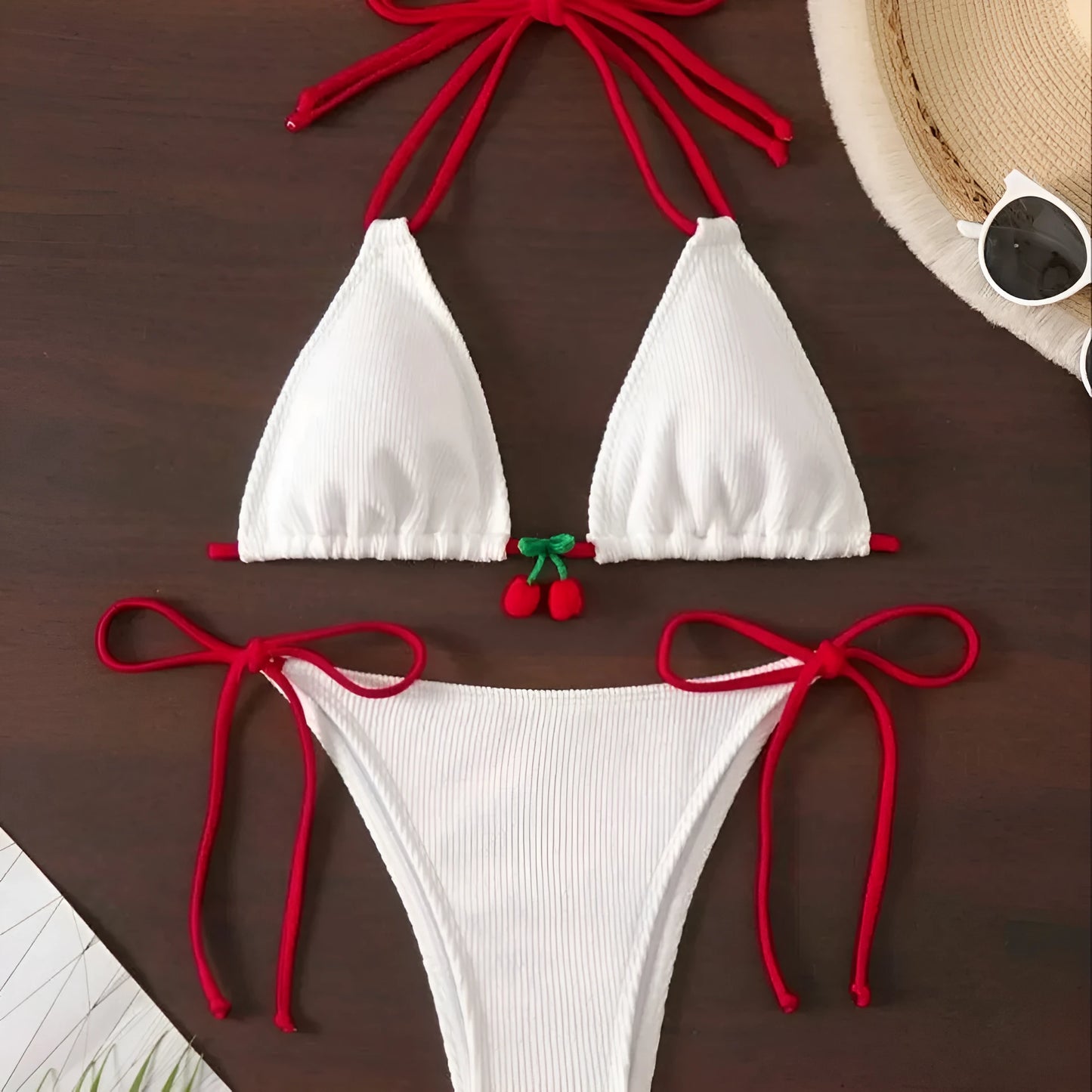 Women's sexy wind style bikini swimsuit in a solid colour, showing backless briefs design.