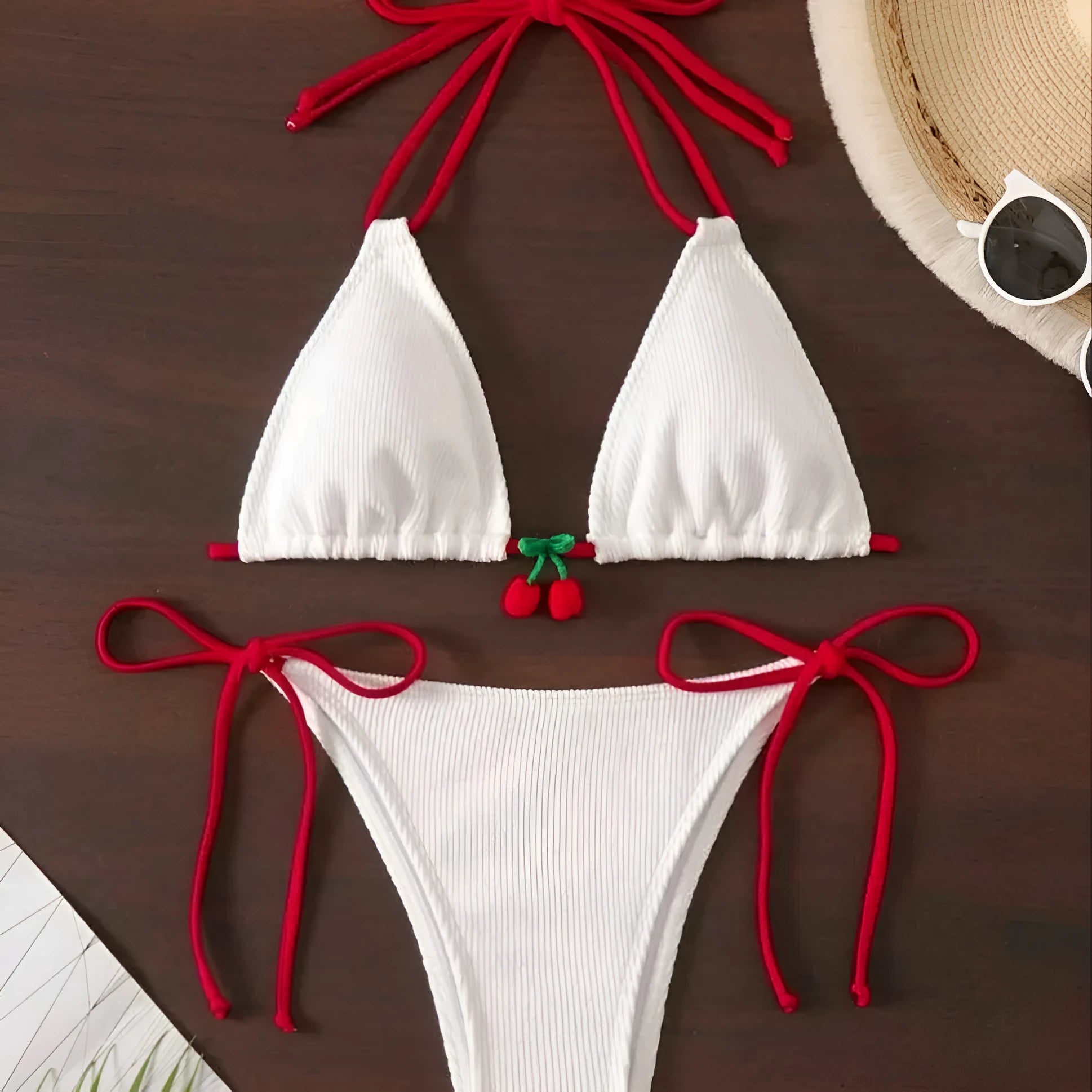Women's sexy wind style bikini swimsuit in a solid colour, showing backless briefs design.