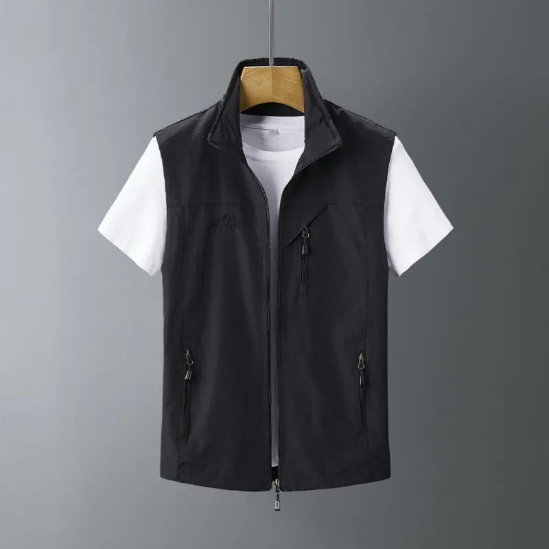 Man wearing a slim-fit hooded waistcoat made of rabbit fur in a casual outdoor setting.